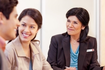 financial advisor consulting with clients
